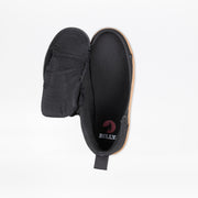 The Black/Gum BILLY CS High by BILLY Footwear is a kids’ high top sneaker with a tan sole, shown from above. Its upper has a full wrap zipper, unzipped and folded open to reveal an insole featuring the white and red BILLY logo.