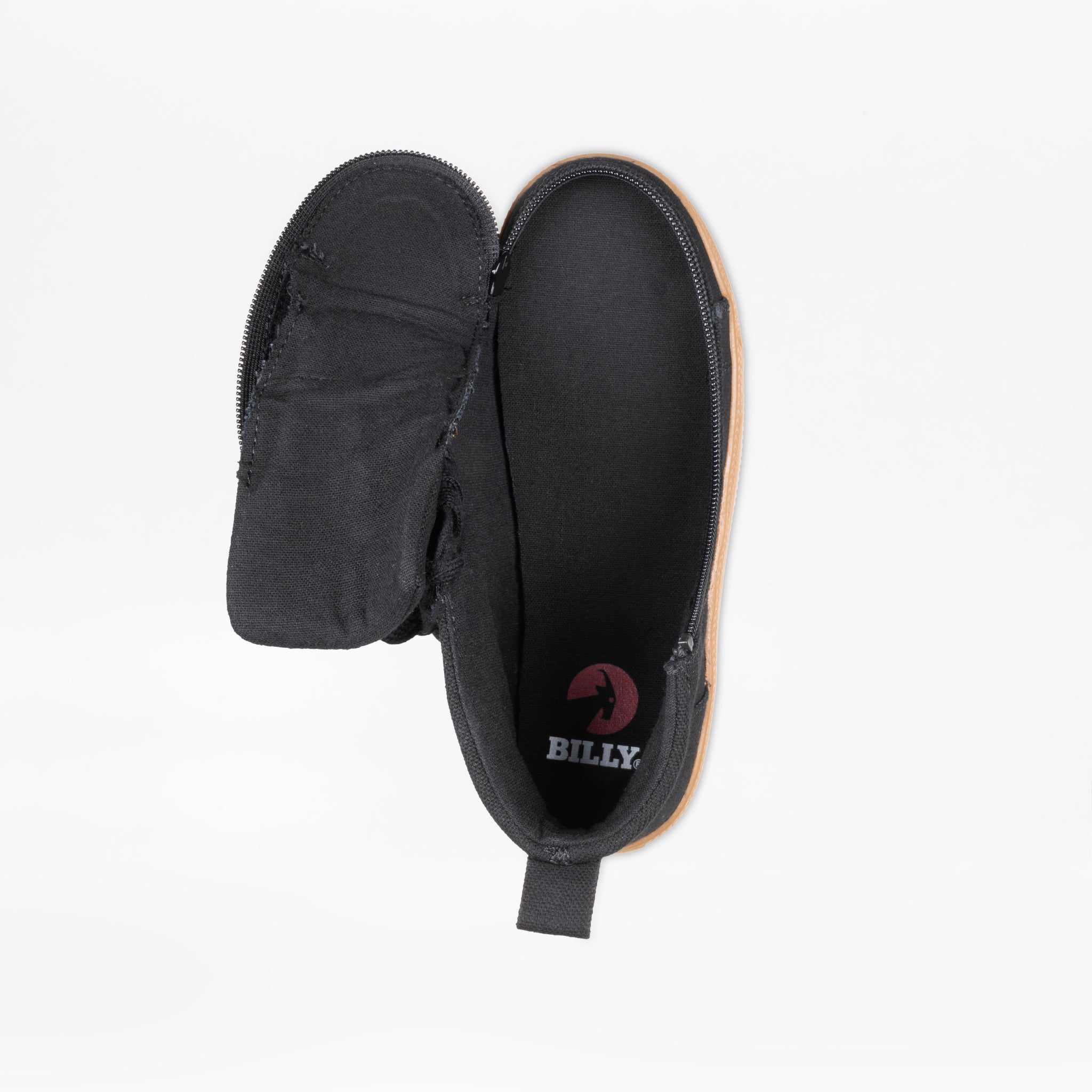 The Black/Gum BILLY CS High by BILLY Footwear is a kids’ high top sneaker with a tan sole, shown from above. Its upper has a full wrap zipper, unzipped and folded open to reveal an insole featuring the white and red BILLY logo.