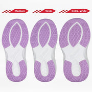 Three Lilac Watercolor BILLY Limitless soles from BILLY Footwear, in Medium, Wide, and Extra-Wide widths, are shown side by side to display the sensory-friendly shoe’s width options with purple and white treads.