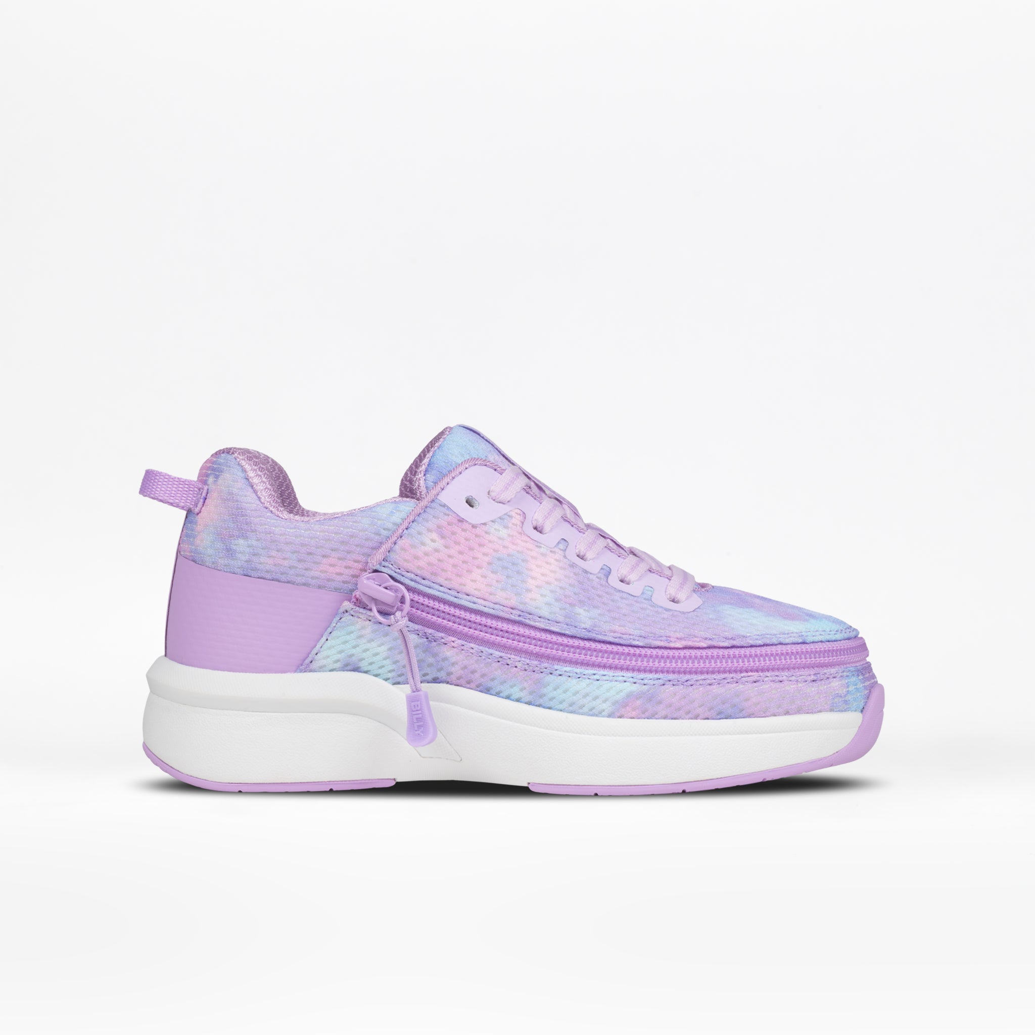 The Kids' Limitless by BILLY Footwear is a lilac, pastel-inspired adaptive sneaker for kids, featuring laces, a front zipper for easy access, and a thick white sole with colorful pink-purple-blue tie-dye accents.