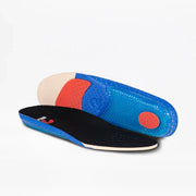 Orthopedic insoles with a black top layer, blue sides, and red and beige cushioning zones—ideal for enhancing comfort in the Men's Black to the Floor BILLY CS High sneakers by BILLY Footwear. Shown on a white background.