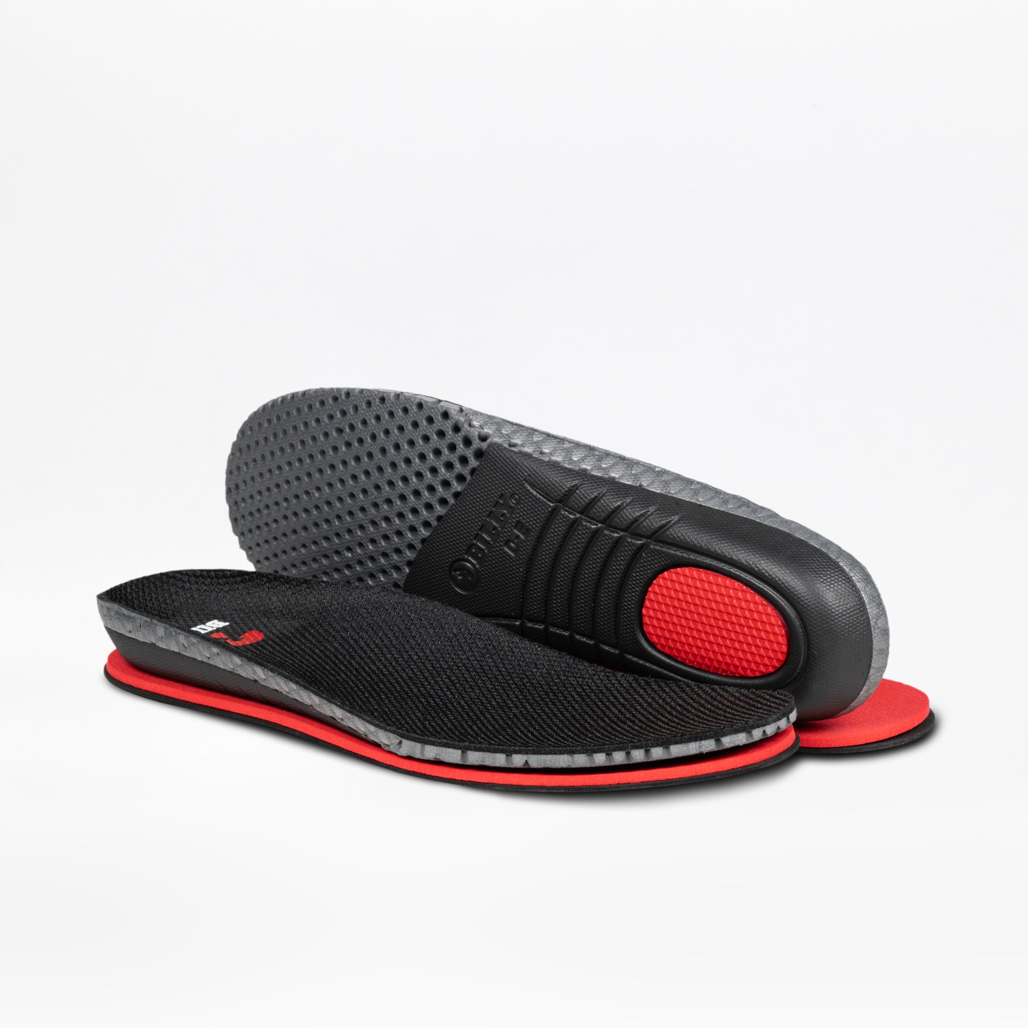 A pair of Men's Black BILLY Limitless insoles by BILLY Footwear—one flat, one angled to reveal the textured gray underside and red cushioned heel—are shown on a white background, ideal for sensory-friendly shoes.