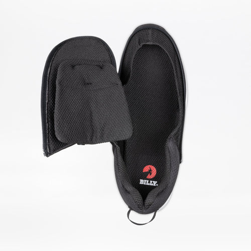 Top view of the Men's Black BILLY Limitless by BILLY Footwear with the front unzipped to show the interior and red logo insole. Its textured fabric and circular heel pull tab highlight an easy-on/easy-off design.