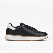 The BILLY Footwear Men's Comfort Luxe in black features black laces, a white cushioned heel tab, white midsole, and light brown outsole for style and comfort. Shown on a plain white background, it suits any occasion.