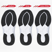 Three Women's Black BILLY Limitless sneaker soles by BILLY Footwear—Medium, Wide, and Extra-Wide—are shown side by side, highlighting the increasing width and size for adjustable depth or sensory friendly shoes.