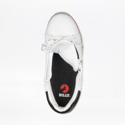 A top view of the Women's White Leather BILLY Comfort Luxe shoe by BILLY Footwear shows its tongue pulled down to reveal a black insole with a red BILLY logo, white laces, and a black heel accent.